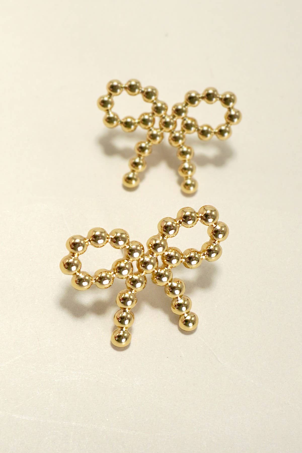 18K STAINLESS STEEL TARNISH FREE BOW STUD EARRINGS | 40E321: Gold