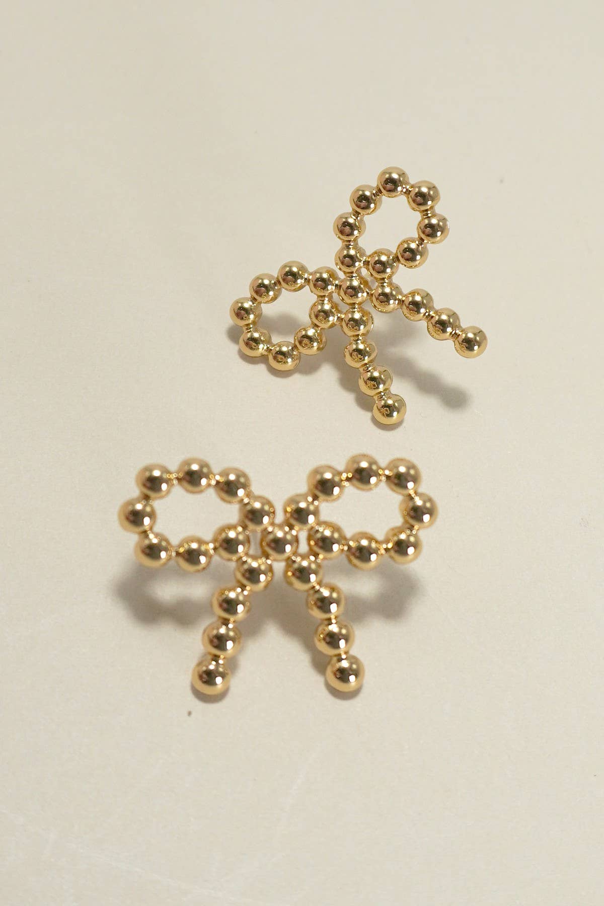 18K STAINLESS STEEL TARNISH FREE BOW STUD EARRINGS | 40E321: Gold