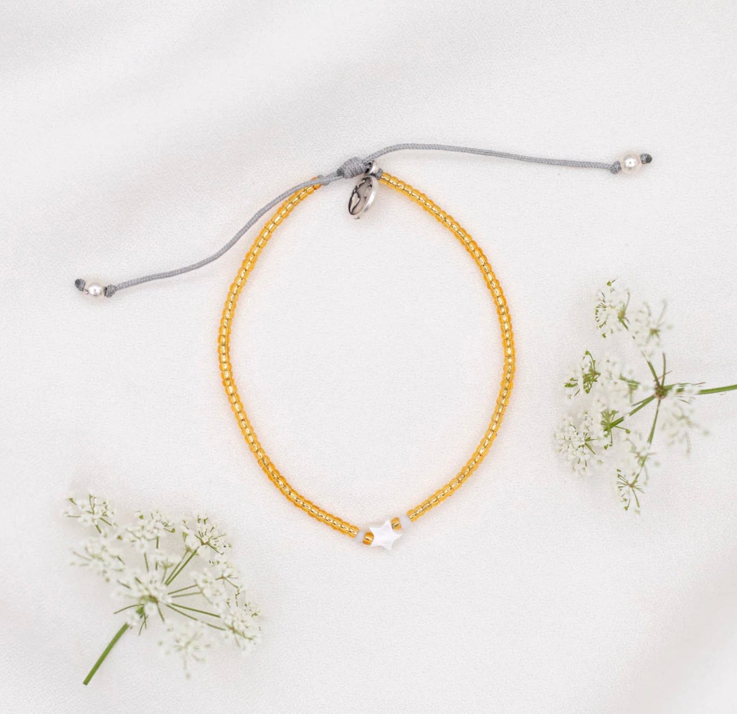 Kind Star White & Gold Bracelet